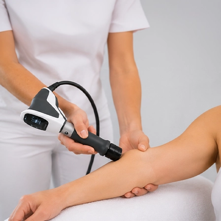 Shockwave Therapy On Someone's Elbow